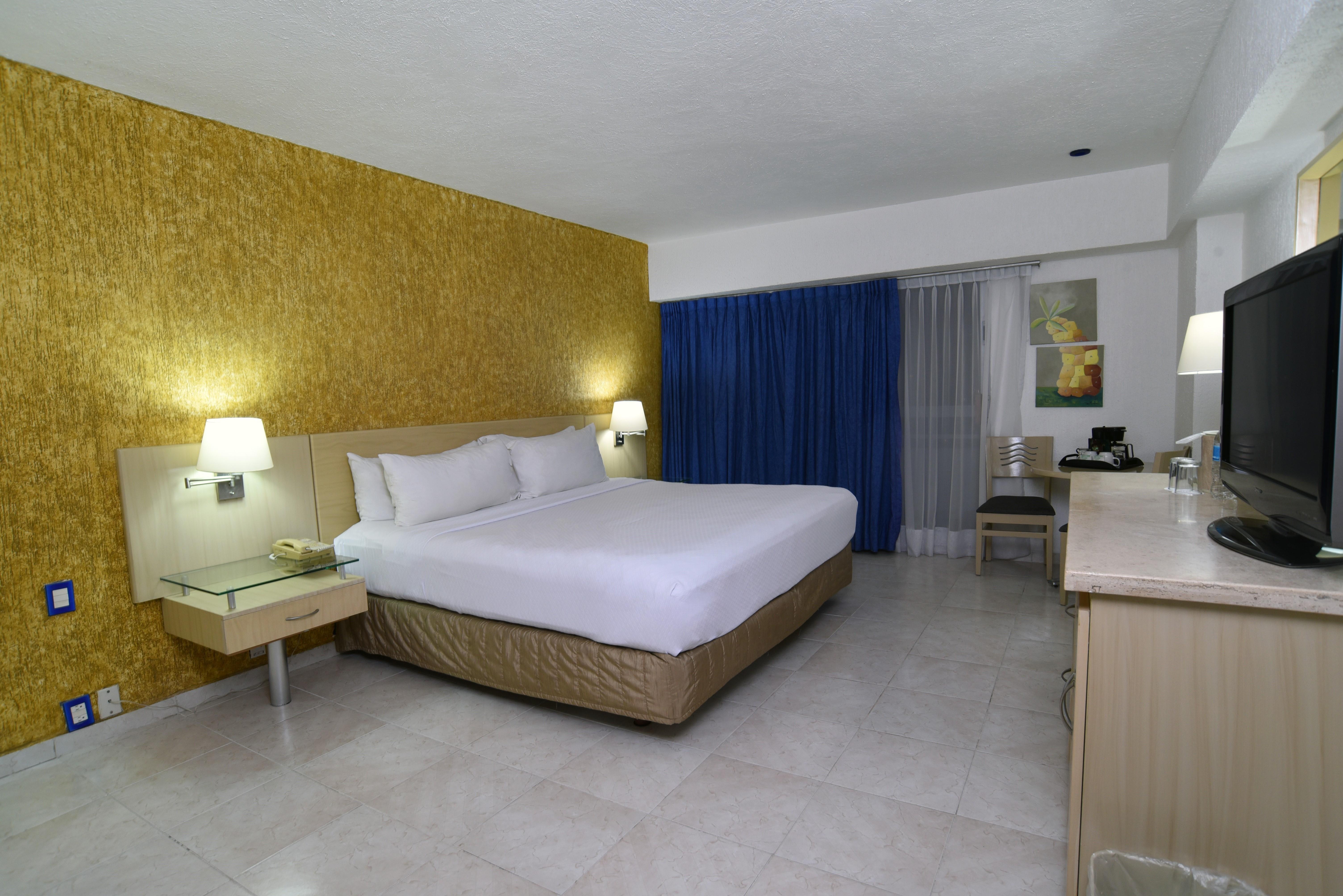 Hs Hotsson Hotel Acapulco Buitenkant foto A room at the hotel
